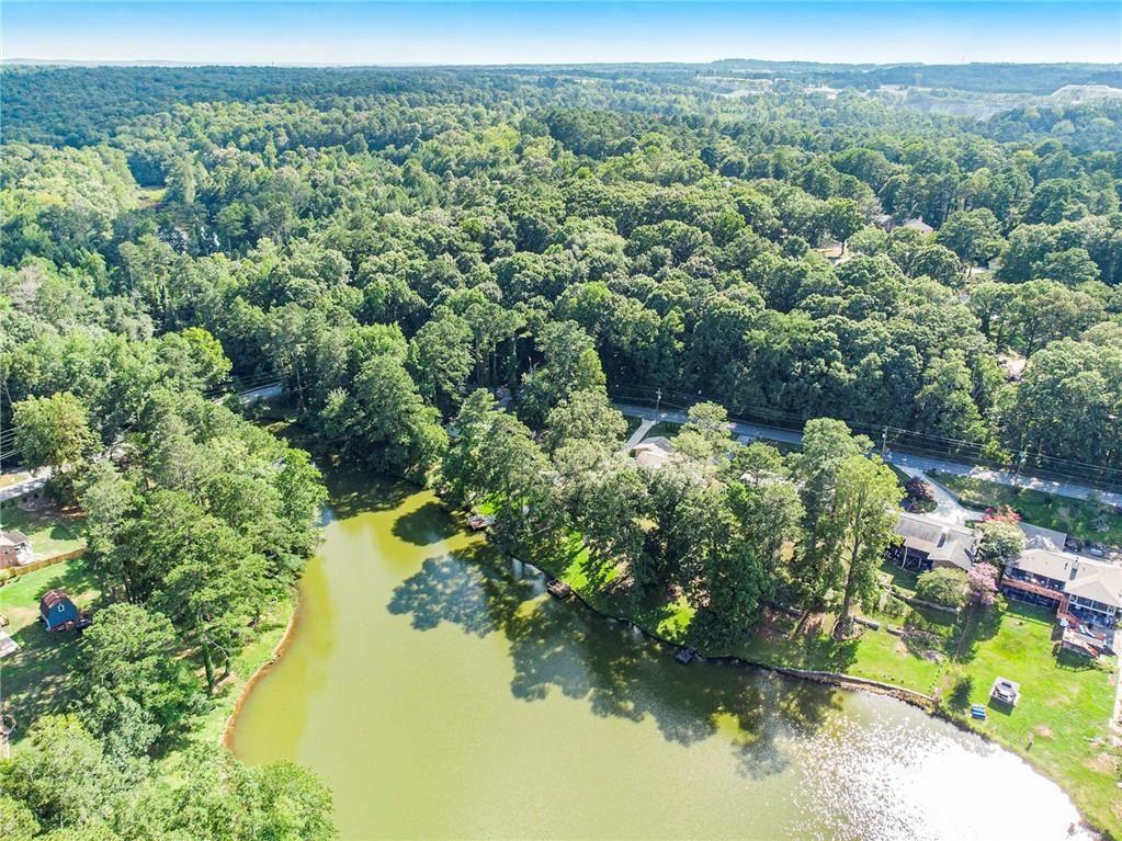2545 Rockbridge Road Northwest Conyers, GA 30012 - Photo 57 of 61 a view of a lake with houses