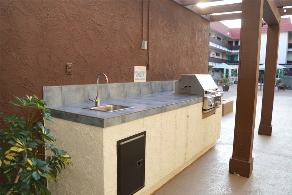 3939 East Allin, Unit 109 Long Beach, CA 90803 - Photo 13 of 21 a bathroom with a sink and a mirror