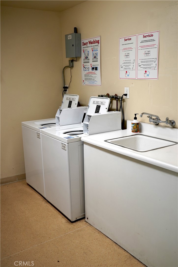 3939 East Allin, Unit 109 Long Beach, CA 90803 - Photo 15 of 21 a utility room with dryer and washer