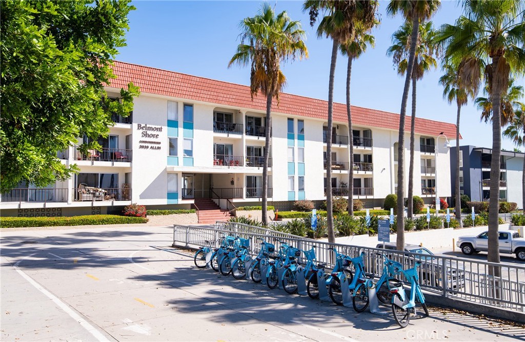 3939 East Allin, Unit 109 Long Beach, CA 90803 - Photo 21 of 21 a view of houses with a swimming pool
