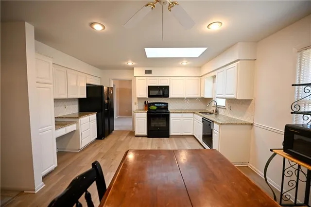 $430,000 | 909 Tam-O-Shanter Drive, Kansas City, MO 64145