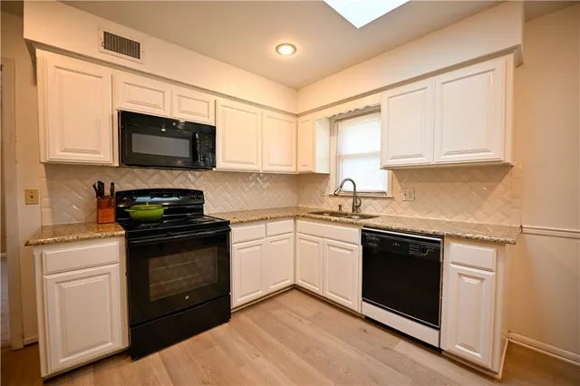 $430,000 | 909 Tam-O-Shanter Drive, Kansas City, MO 64145