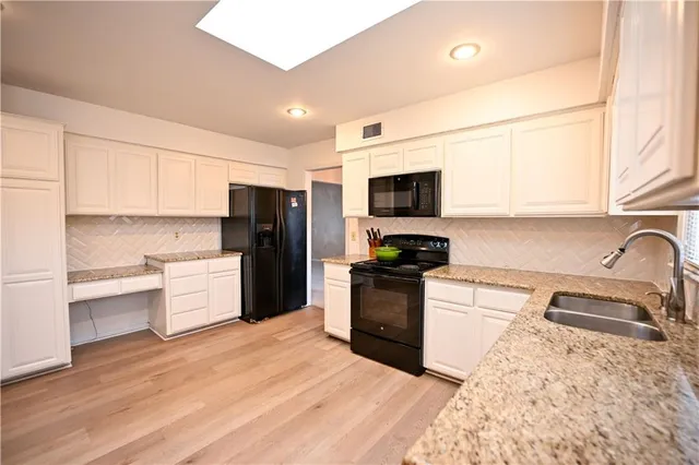 $430,000 | 909 Tam-O-Shanter Drive, Kansas City, MO 64145