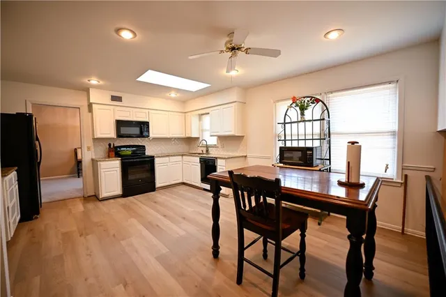 $430,000 | 909 Tam-O-Shanter Drive, Kansas City, MO 64145