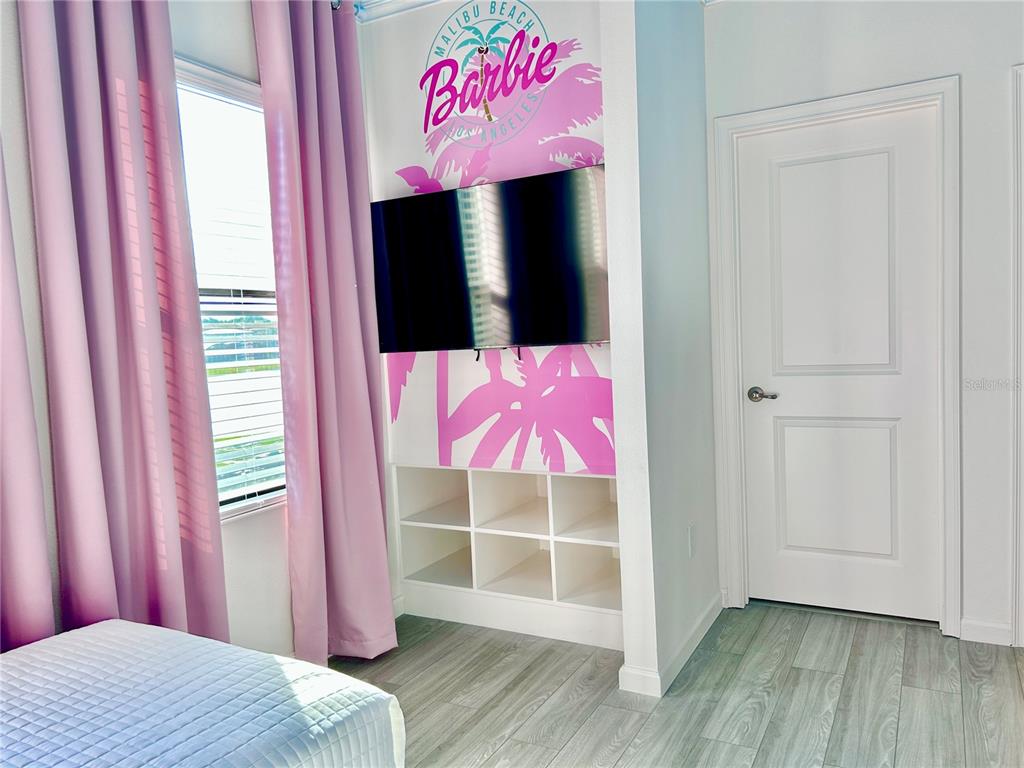 6271 Sand Skipper Road Orlando, FL 32821 - Photo 36 of 46 a view of a room with wooden floor and door