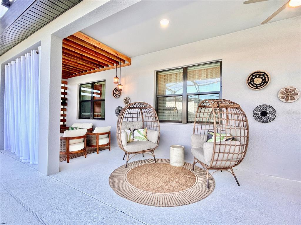 6271 Sand Skipper Road Orlando, FL 32821 - Photo 4 of 46 a living room with furniture and a window