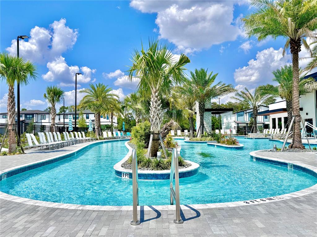 6271 Sand Skipper Road Orlando, FL 32821 - Photo 42 of 46 a view of a house with backyard porch and sitting area
