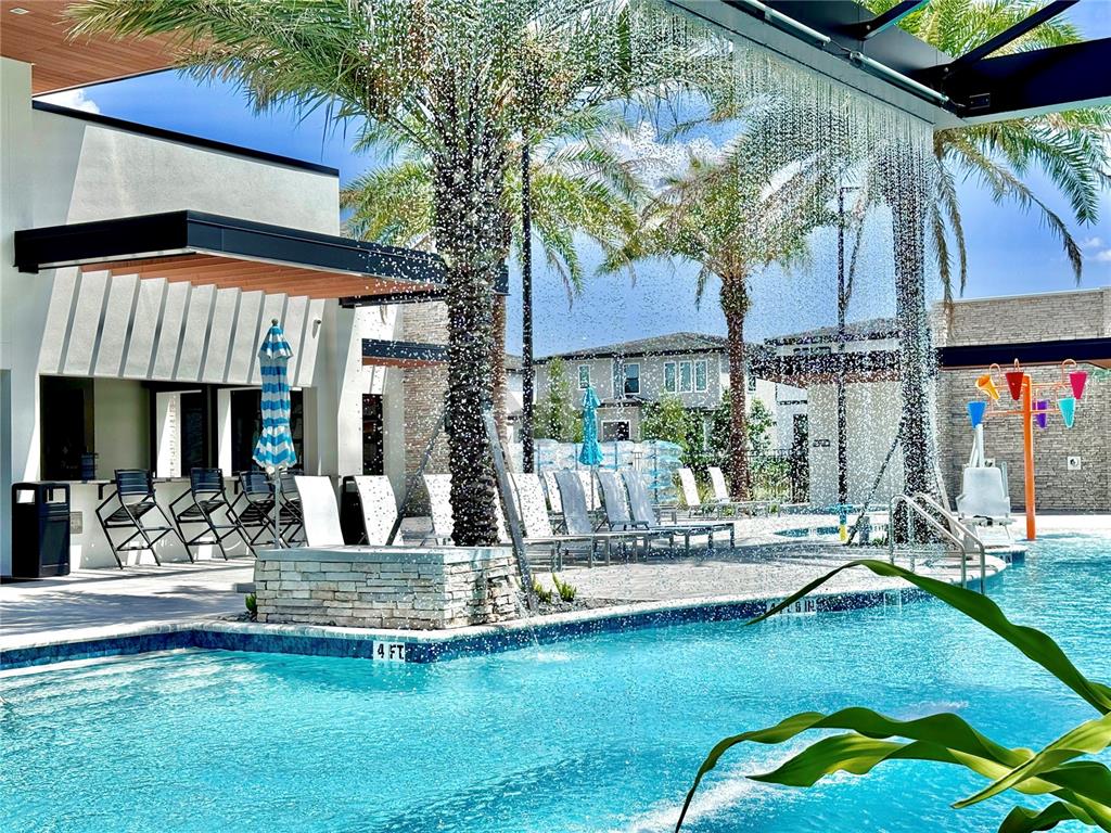 6271 Sand Skipper Road Orlando, FL 32821 - Photo 43 of 46 a view of a house with a swimming pool