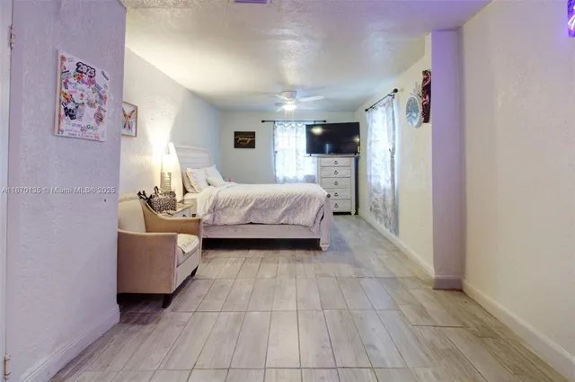 a bathroom with a mirror and a shower