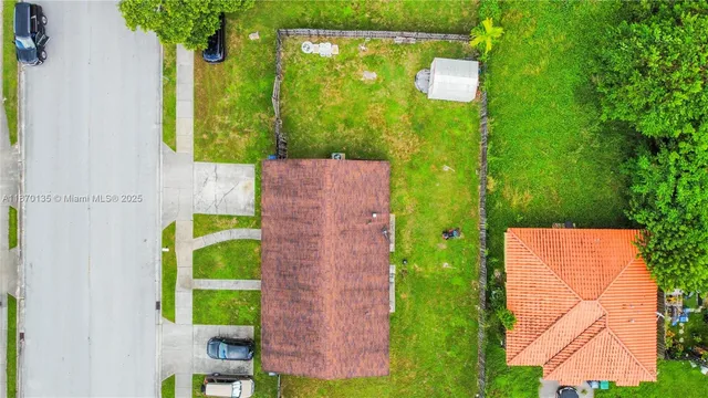 a front view of house with yard
