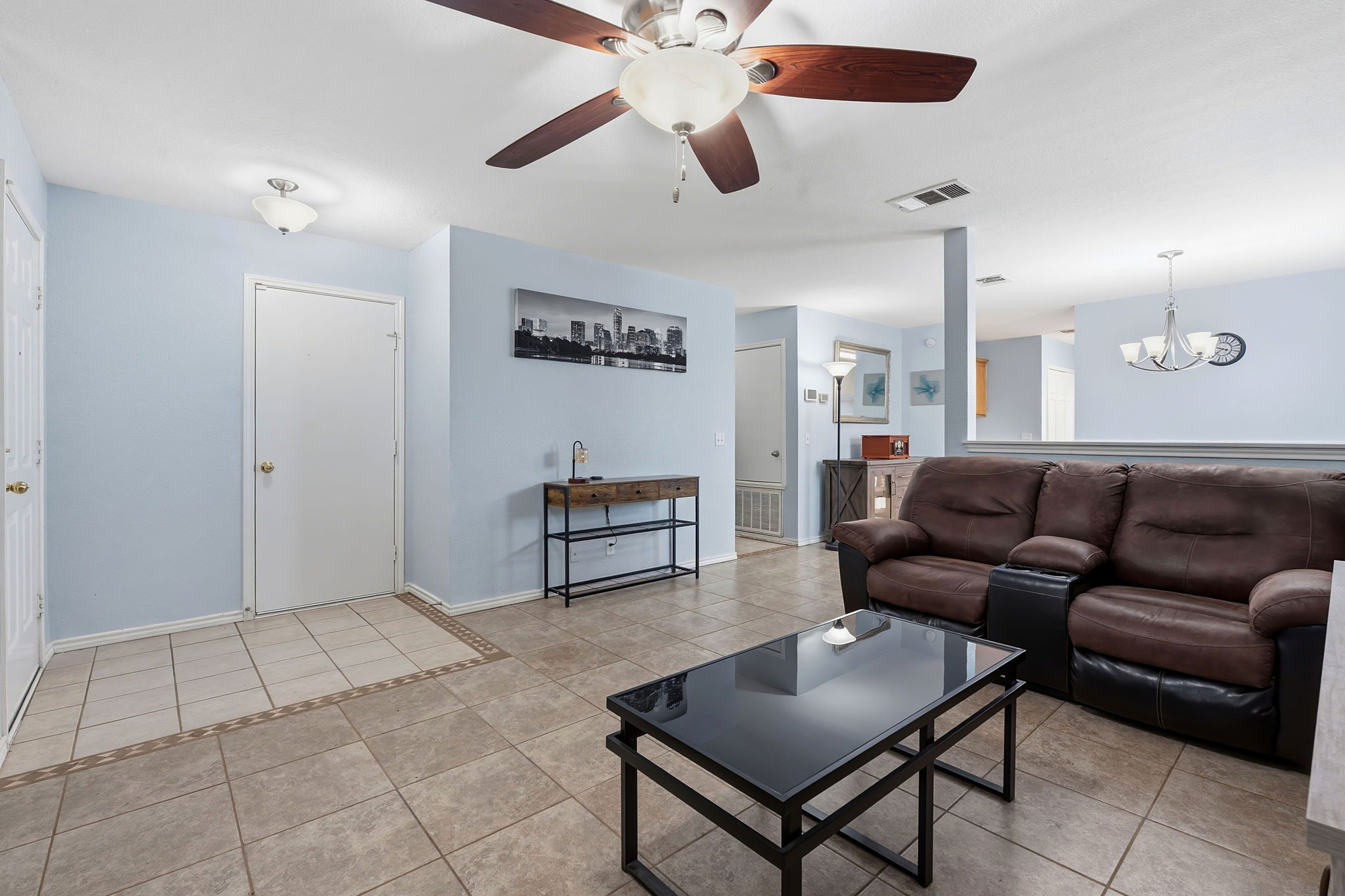 626 Atlantis Kyle, TX 78640 - Photo 10 of 23 a living room with furniture and a ceiling fan