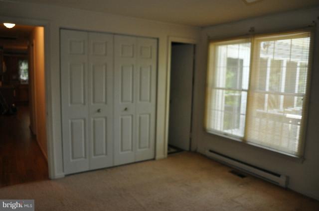 11538 Durango Road Lusby, MD 20657 - Photo 7 of 15 a view of an empty room and window