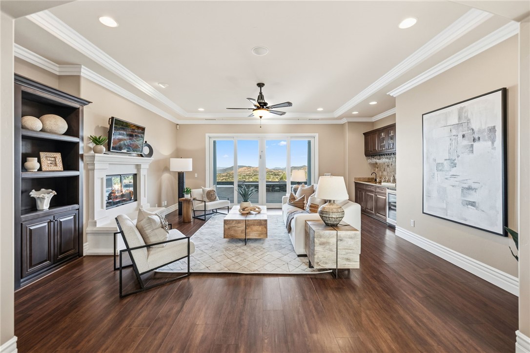 40267 Scanlon Road Temecula, CA 92592 - Photo 15 of 68 a living room with fireplace furniture and decor