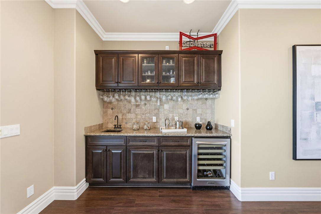 40267 Scanlon Road Temecula, CA 92592 - Photo 19 of 68 a kitchen with a sink and cabinets