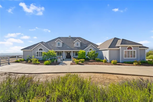 a view of a dining room kitchen with furniture and wooden floor