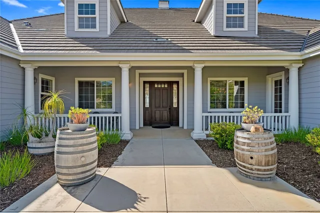 a kitchen with stainless steel appliances granite countertop a stove and a refrigerator