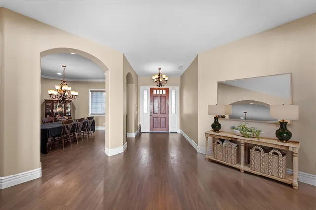 a kitchen with stainless steel appliances granite countertop a stove oven and refrigerator