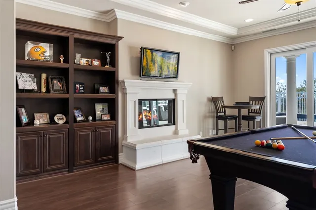 a spacious bathroom with a granite countertop sink a light fixture and a mirror