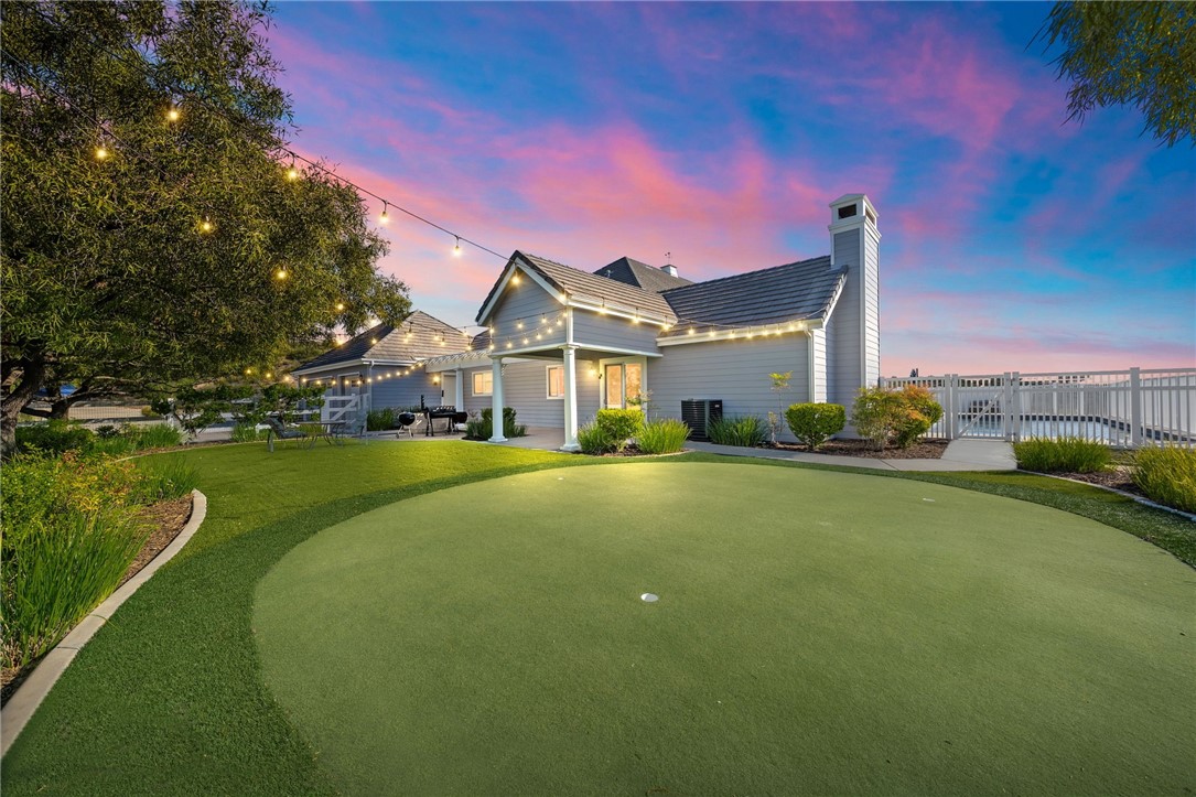 40267 Scanlon Road Temecula, CA 92592 - Photo 4 of 68 a front view of a house with a big yard
