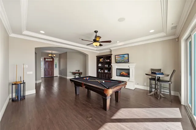 a bedroom with a bed and a fireplace