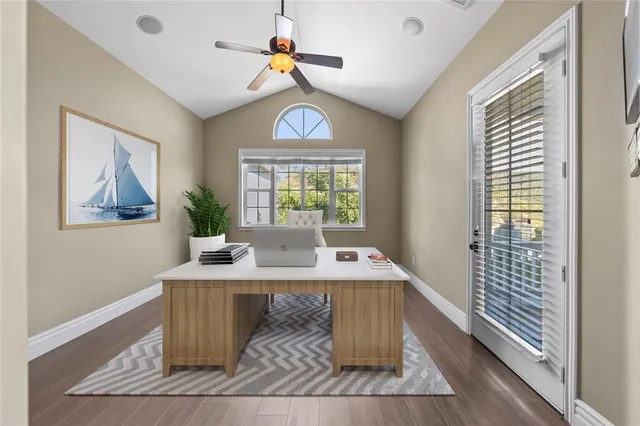 a large spacious bathroom with a tub a double vanity sink and mirror