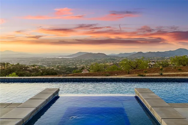 a view of houses with a city street