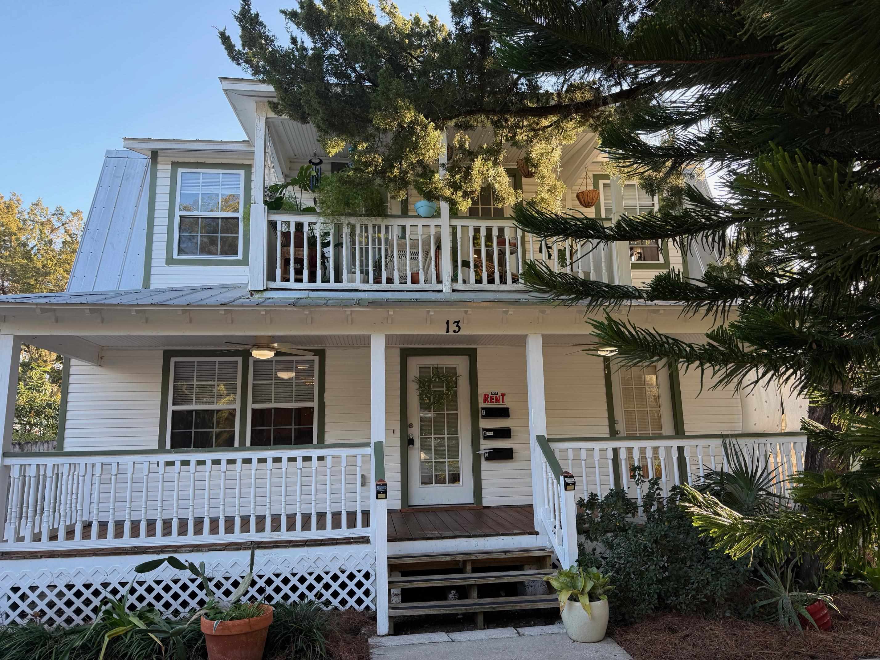 13 Williams Street, Unit C St. Augustine, FL 32084 - Photo 7 of 8 a view of a house with a deck