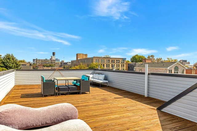 a view of a balcony with city view