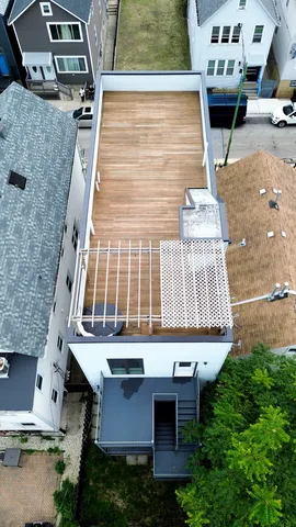 a front view of residential houses with outdoor space