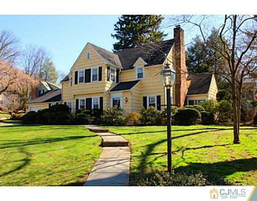 33 Edgewood Road Edison, NJ 08820 - Photo 1 of 25 a view of an house with backyard and a tree