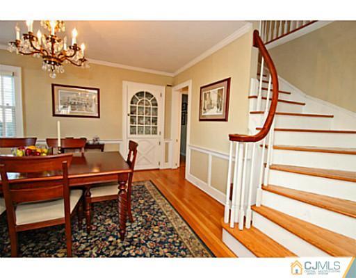 33 Edgewood Road Edison, NJ 08820 - Photo 6 of 25 a living room with furniture and a dining table