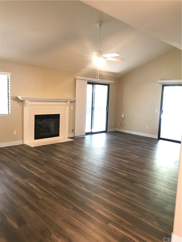 21050 Vandenberg Riverside, CA 92518 - Photo 5 of 24 an empty room with wooden floor and windows