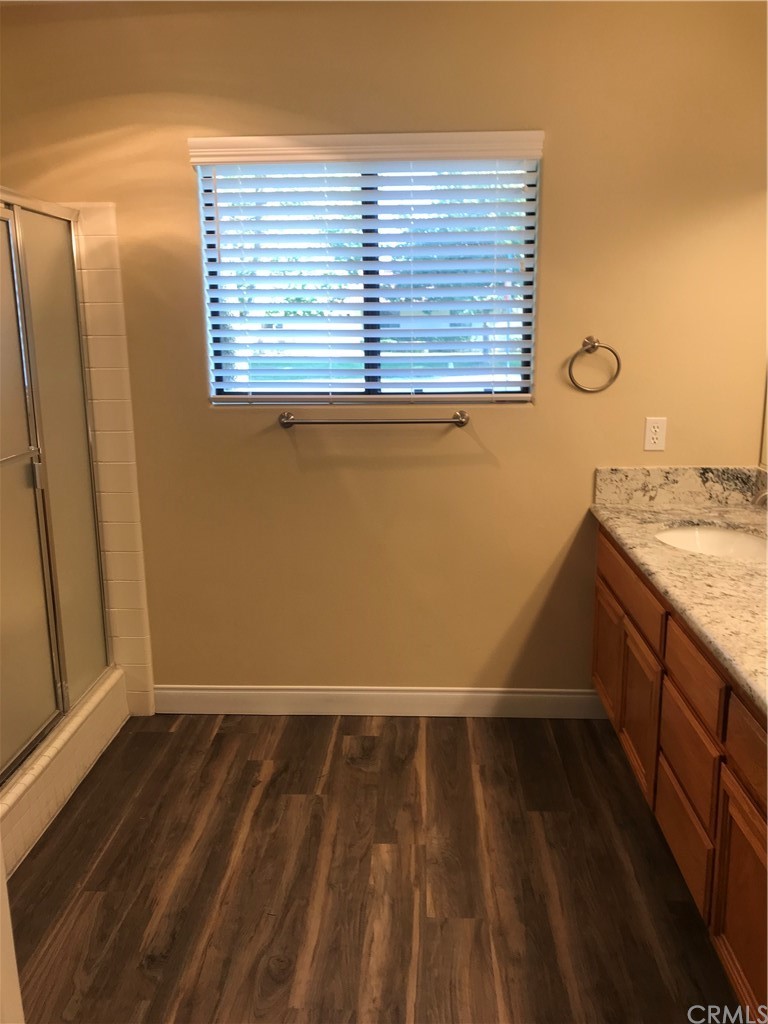 21050 Vandenberg Riverside, CA 92518 - Photo 10 of 24 a view of storage and utility room with wooden floor