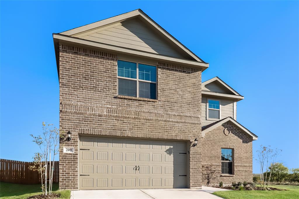 209 Switchback Hill Road Newark, TX 76071 - Photo 14 of 17 a front view of a house with a yard