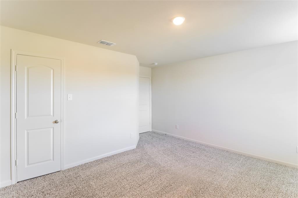 209 Switchback Hill Road Newark, TX 76071 - Photo 7 of 17 a view of an empty room