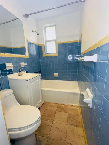 a bathroom with a sink and bathtub