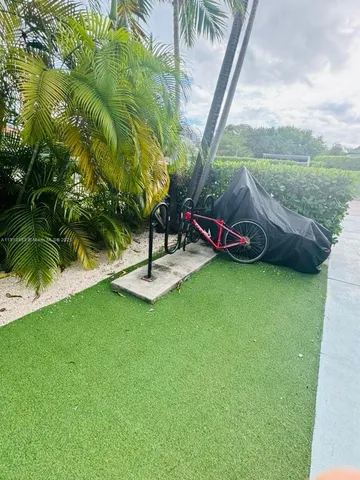 a view of swimming pool from a yard
