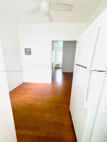 a view of a big room with wooden floor