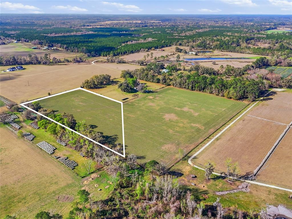 239 Northwest County Road Alachua, FL 32615 - Photo 2 of 6 an aerial view of a city