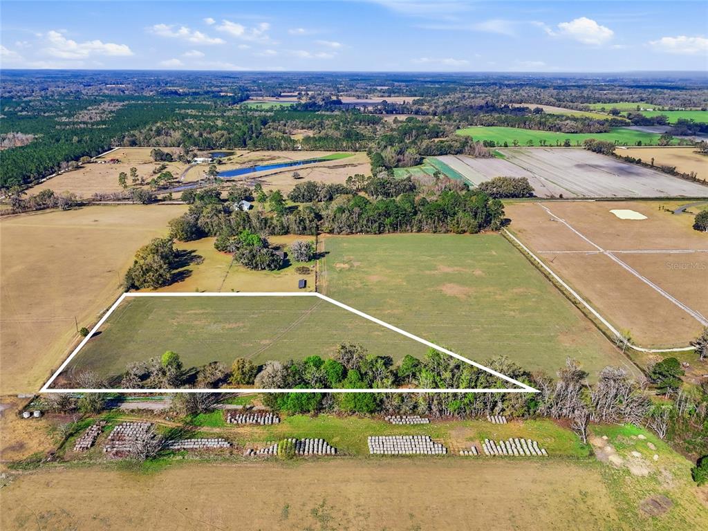 239 Northwest County Road Alachua, FL 32615 - Photo 3 of 6 an aerial view of a city