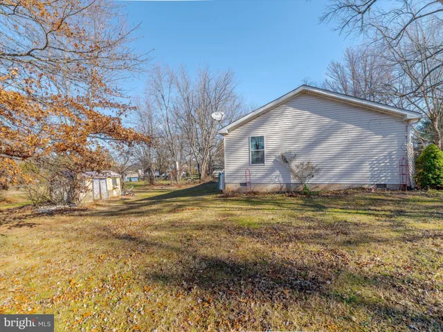 a front view of house with garden