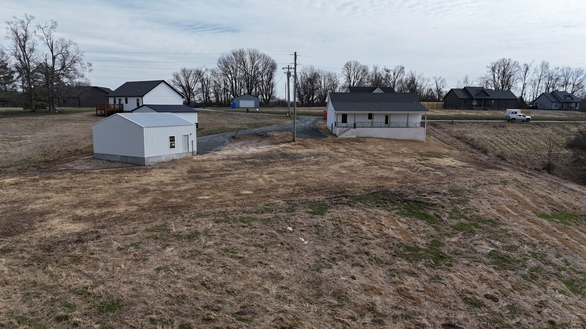 575 Pleasant Hill Road Lafayette, TN 37083 - Photo 49 of 51 a view of a house with a yard