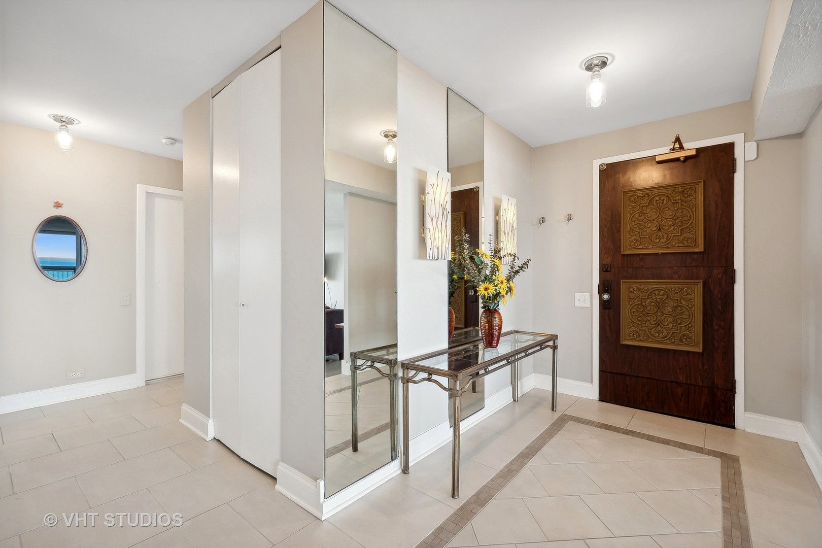 5733 North Sheridan Road, Unit 16A Chicago, IL 60660 - Photo 21 of 29 a spacious bathroom with a shower and a mirror