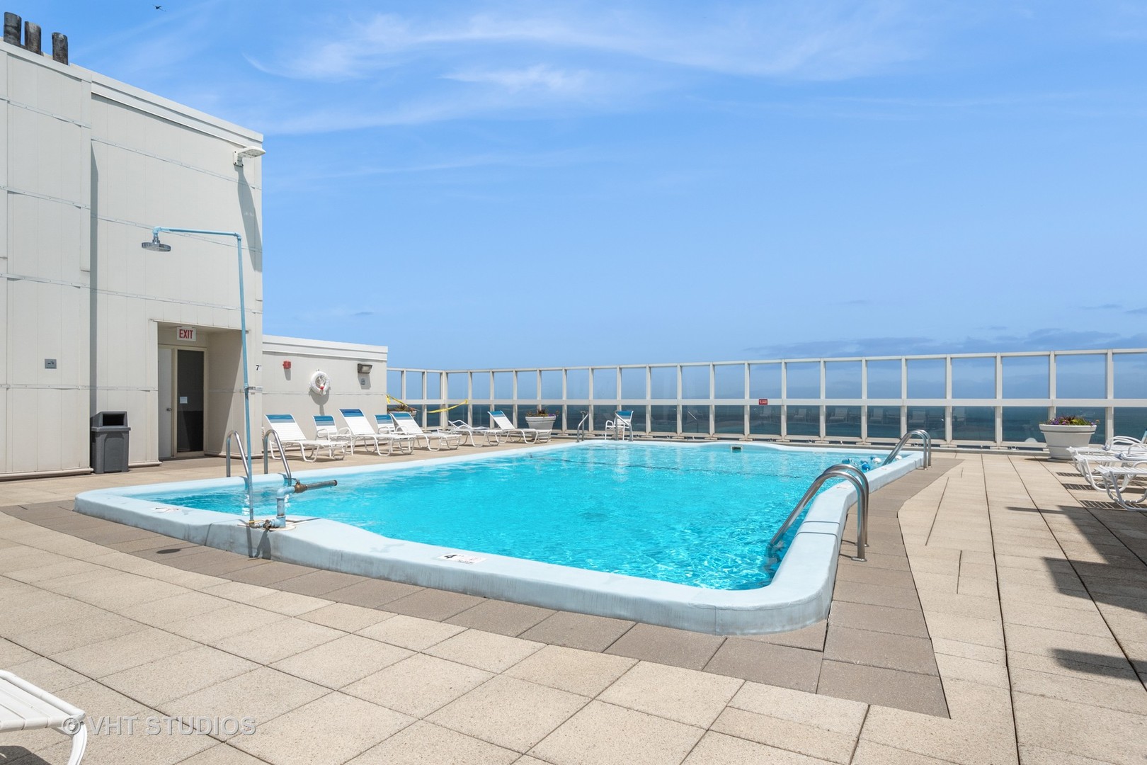 5733 North Sheridan Road, Unit 16A Chicago, IL 60660 - Photo 24 of 29 a view of a swimming pool with a lounge chair