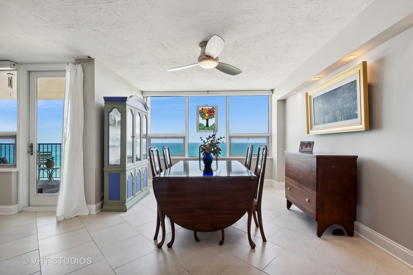 5733 North Sheridan Road, Unit 16A Chicago, IL 60660 - Photo 6 of 29 a dining room with furniture and window