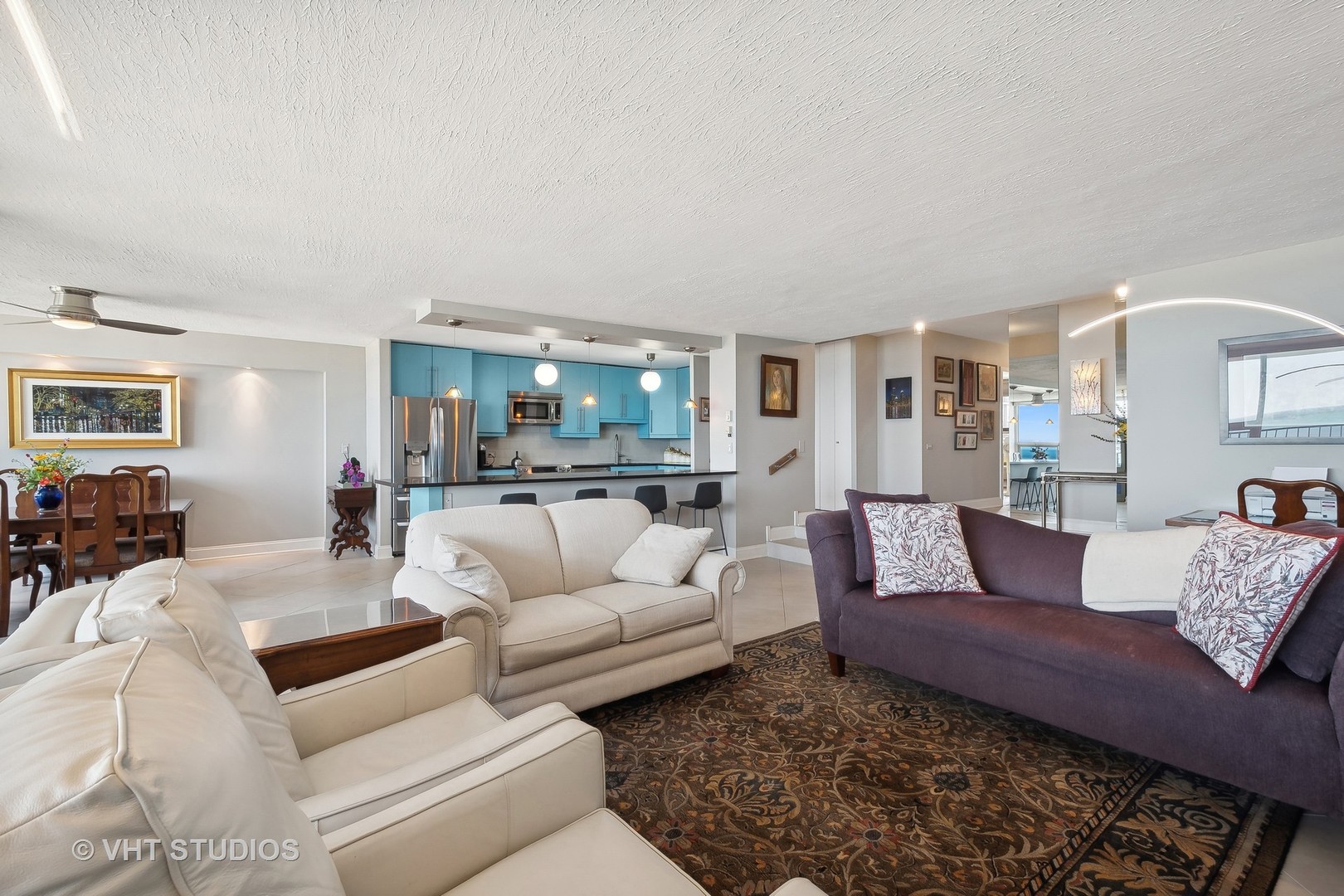 5733 North Sheridan Road, Unit 16A Chicago, IL 60660 - Photo 8 of 29 a living room with furniture and a large window