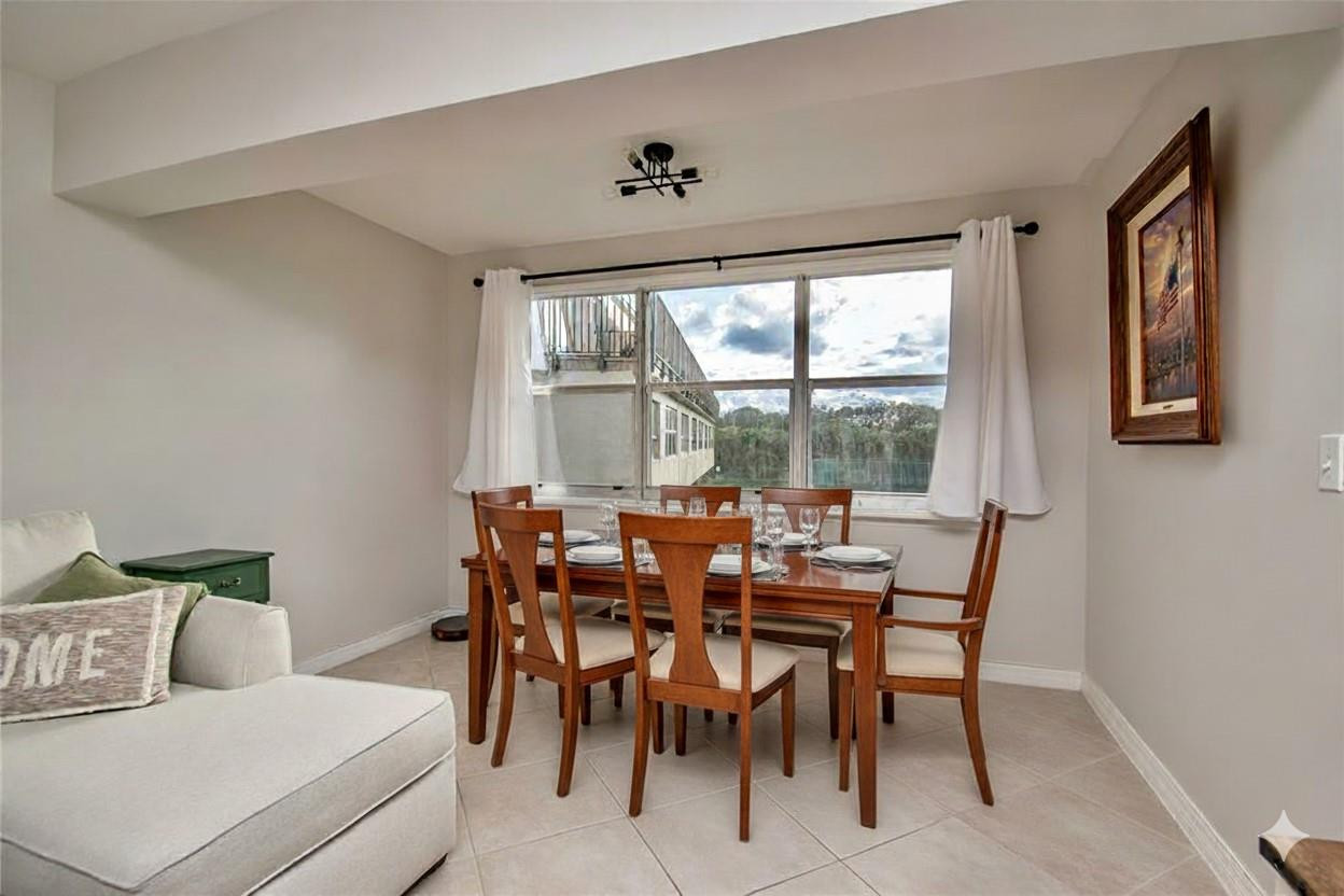 9500 Southwest 3rd Street, Unit 248 Boca Raton, FL 33428 - Photo 5 of 47 Virtually staged dining room