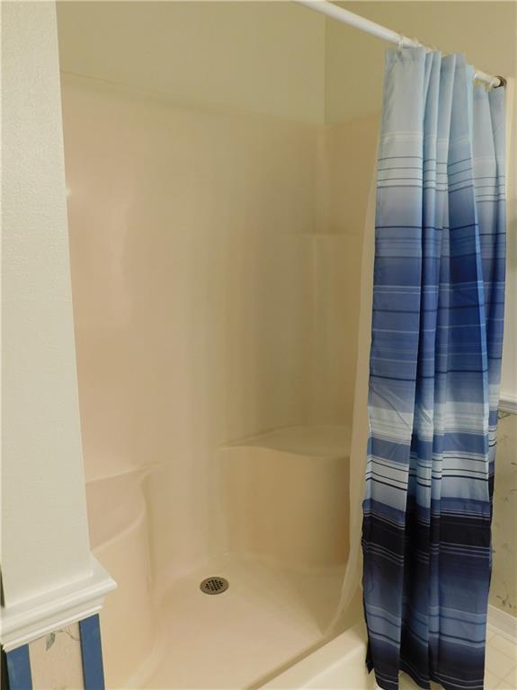 7601 Pensacola Road Fort Pierce, FL 34951 - Photo 12 of 14 a bathroom with a shower