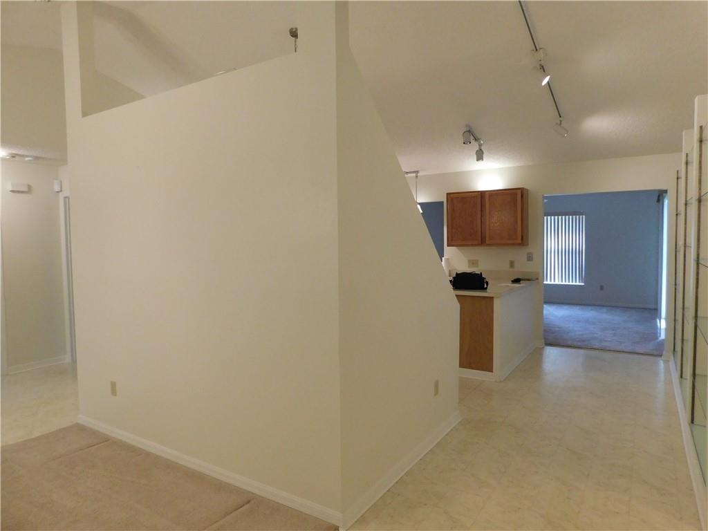 7601 Pensacola Road Fort Pierce, FL 34951 - Photo 4 of 14 a view of a livingroom with a tv