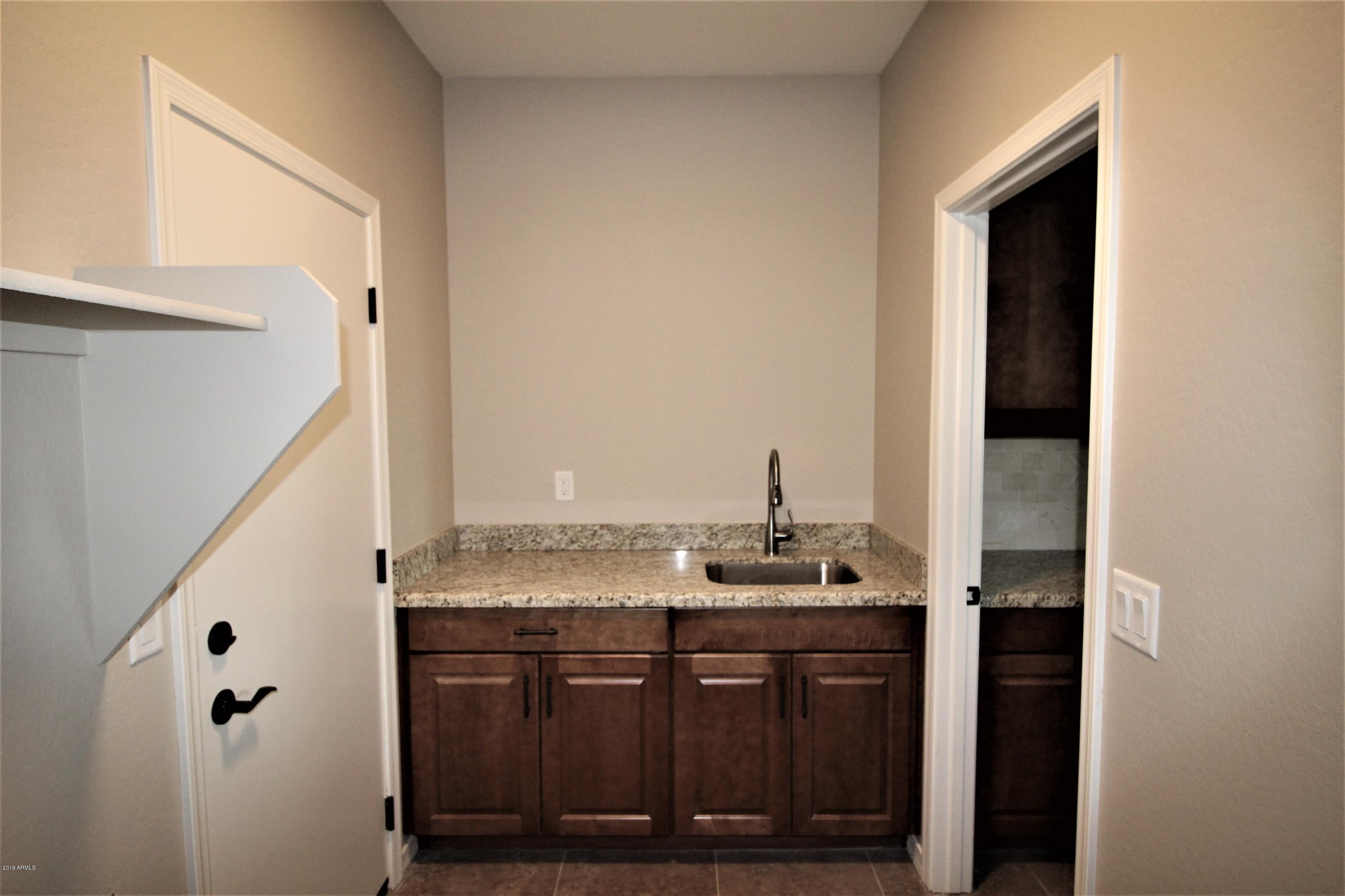 1736 West Tamar Road Phoenix, AZ 85086 - Photo 11 of 15 2311 LAUNDRY SINK